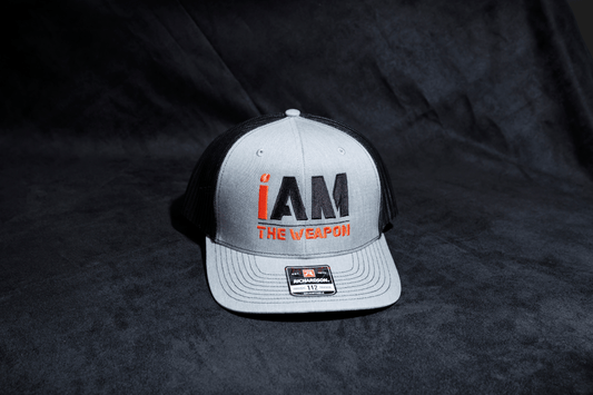 I Am the Weapon Trucker Hat